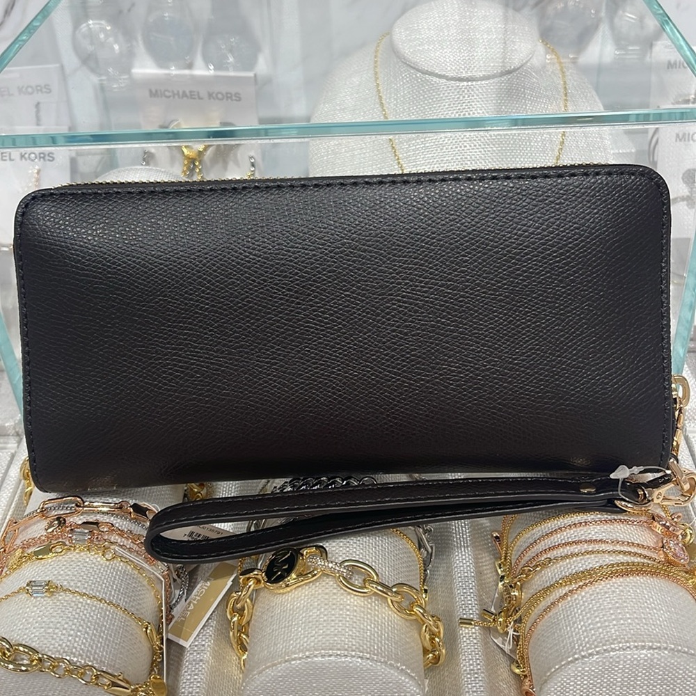 Michael Kors JST Lg Leather Continental Wallet Wristlet Phone Holder C
Chocolate - Picture 15 of 16